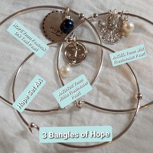 SET OF THREE VANTEL PEARL BANGLES OF HOPE